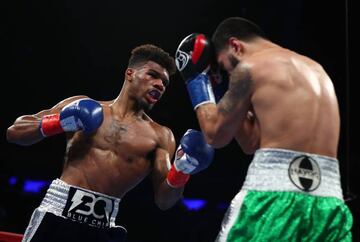 Ryan Martin golpea a Bryant Cruz en el transcurso de su combate en el Madison Square Garden.