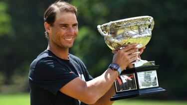 Tennis - Australian Open - Men's Singles Photo Shoot - Melbourne, Australia - January 31, 2022 Spain's Rafael Nadal poses with the Norman Brookes Challenge Cup trophy after winning the Australian Open Joel Carrett/AAP Image via REUTERS ATTENTION