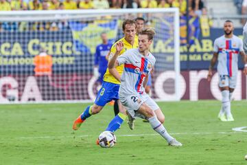 Álex Fernández y Frenkie de Jong.