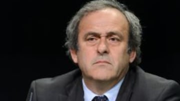 (FILES)-- A file photo taken on May 28, 2015 shows UEFA President Michel Platini giving a press conference prior to the 65th FIFA Congress in Zurich. UEFA chief Michel Platini has appealed against a 90-day suspension imposed on him by world governing body FIFA as part of an ongoing corruption investigation, a close associate said on October 10, 2015. AFP PHOTO / FABRICE COFFRINI