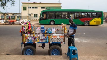 A vendor is seen on the street after the partial lockdown in parts of Ghana to halt the spread of the COVID-19 coronavirus was lifted in Accra, Ghana on April 20, 2020. - The streets of Accra buzzed with life following President Nana Akufo-Addo's ann