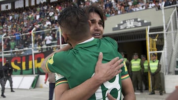 Bolivia&#039;s Marcelos Martins, right, celebrates with his teammates Yasmani Duk, 18, after scoring against Paraguay, during a 2018 World Cup qualifying soccer match in La Paz, Bolivia, Tuesday, Nov. 15, 2016. (AP Photo/Juan Karita)