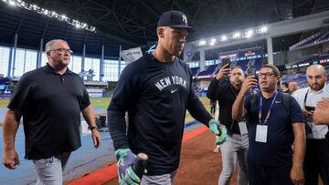 Aug 1, 2025; Miami, Florida, USA; New York Yankees right fielder Aaron Judge (99) enters the dugout after taking batting practice at loanDepot Park. Mandatory Credit: Sam Navarro-Imagn Images