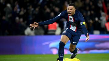 Paris Saint-Germain's French forward Kylian Mbappe celebrates after scoring a goal during the French L1 football match between Paris Saint-Germain (PSG) and FC Nantes at The Parc des Princes Stadium in Paris on March 4, 2023. (Photo by FRANCK FIFE / AFP)