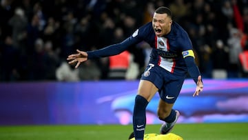 Paris Saint-Germain's French forward Kylian Mbappe celebrates after scoring a goal during the French L1 football match between Paris Saint-Germain (PSG) and FC Nantes at The Parc des Princes Stadium in Paris on March 4, 2023. (Photo by FRANCK FIFE / AFP)