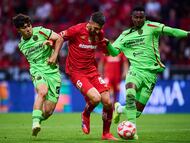 Denzelll Garcia (L) of Juarez, Joao Dias (C) of Toluca and Moises Castillo (R) of Juarez during the 10th round match between Toluca and FC Juarez as part of the Liga BBVA MX Varonil, Torneo Clausura 2026 at Nemesio Diez Stadium, on March 08, 2026 in Toluca, Estado de Mexico, Mexico.