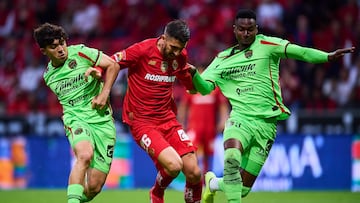 Denzelll Garcia (L) of Juarez, Joao Dias (C) of Toluca and Moises Castillo (R) of Juarez during the 10th round match between Toluca and FC Juarez as part of the Liga BBVA MX Varonil, Torneo Clausura 2026 at Nemesio Diez Stadium, on March 08, 2026 in Toluca, Estado de Mexico, Mexico.