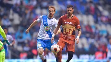 (L-R), Fernando Aristeguieta of Puebla and Arturo Ortiz of Pumas during the game Puebla vs Pumas UNAM, corresponding to day 13 of the Torneo Clausura Grita Mexico C22 of Liga BBVA MX, at Cuauhtemoc Stadium, on April 08, 2022.
<br><br>
(I-D), Fernando Aristeguieta de Puebla y Arturo Ortiz de Pumas durante el partido Puebla vs Pumas UNAM, correspondiente a la jornada 13 del Torneo Clausura Grita Mexico C22 de la Liga BBVA MX, en el Estadio Cuauhtemoc, el 08 de Abril de 2022.