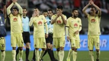 Los futbolistas del América celebran tras ganar el partido por el quinto puesto del Mundial de Clubes 2015 ante el Mazembe, en Osaka (Japón)