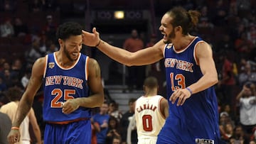 Nov 4, 2016; Chicago, IL, USA; New York Knicks center Joakim Noah (13) and New York Knicks guard Derrick Rose (25) celebrate during the second half at  the United Center. The Knicks won 117-104. Mandatory Credit: David Banks-USA TODAY Sports