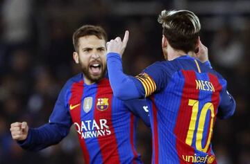 Messi (right) celebrates with team-mate Jordi Alba after levelling for Los Azulgranas at Real Sociedad.