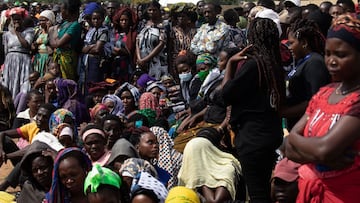 GEITA, TANZANIA - MARCH 25: People wait for President Magufuli's casket to arrive on March 25, 2021 in Chato, Tanzania. The country has held a series of services to mourn the late president that culminates with his burial in his hometown of Chato. President Magufuli died last week after having gone several weeks without public appearances. Tanzanian officials said the cause of death was heart disease. (Photo by Luke Dray/Getty Images)