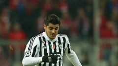 Alvaro Morata of Juventus Turin runs with the ball during the UEFA Champions League Round of 16 Second Leg match between FC Bayern Muenchen and Juventus at Allianz Arena on March 16, 2016 in Munich, Germany.