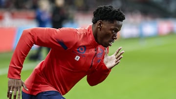 Lille's Canadian forward #09 Jonathan David warms up ahead of the French L1 football match between Lille LOSC and Olympique Marseille (OM) at Stade Pierre-Mauroy in Villeneuve-d'Ascq, northern France on April 5, 2024. (Photo by Sameer Al-DOUMY / AFP)