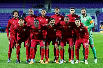 Qatar players pose for a team group photo 