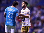 Gabriel Fernandez of Cruz Azul and Nathanael Ananias of Pumas during the 14th round match between Cruz Azul and Pumas UNAM as part of the Liga BBVA MX, Torneo Clausura 2025 at Cuauhtemoc Stadium, on April 05, 2025 in Puebla, Mexico.