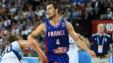 France's Leo Westermann (C) reacts during the Group A qualification basketball match between France and Bosnia and Herzegovina at the EuroBasket 2015 in Montpellier on September 06, 2015. AFP PHOTO / PASCAL GUYOT