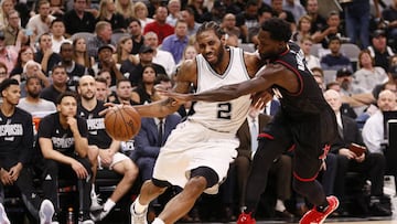 May 9, 2017; San Antonio, TX, USA; San Antonio Spurs small forward Kawhi Leonard (2) drives to the basket as Houston Rockets point guard Patrick Beverley (right) defends during the first half in game five of the second round of the 2017 NBA Playoffs at AT&T Center. Mandatory Credit: Soobum Im-USA TODAY Sports