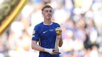 Chelsea's English midfielder #10 Cole Palmer poses with the Golden Ball trophy during the award ceremony for the FIFA Club World Cup 2025 Champions, following the final football match between England's Chelsea and France's Paris Saint-Germain at the MetLife Stadium in East Rutherford, New Jersey on July 13, 2025. (Photo by FRANCK FIFE / AFP)