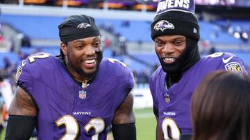 BALTIMORE, MARYLAND - NOVEMBER 03: Derrick Henry #22 and Lamar Jackson #8 of the Baltimore Ravens talk to media after their team's 41-10 win against the Denver Broncos at M&T Bank Stadium on November 03, 2024 in Baltimore, Maryland. Scott Taetsch/Getty Images/AFP (Photo by Scott Taetsch / GETTY IMAGES NORTH AMERICA / Getty Images via AFP)
