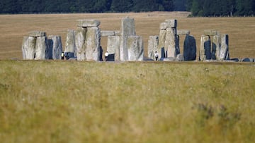 Stonehenge painted orange by climate activists before summer solstice