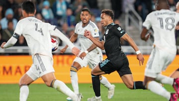 Oct 7, 2023; Saint Paul, Minnesota, USA; Minnesota United midfielder Hassani Dotson (31) runs with the ball against Los Angeles Galaxy defender Maya Yoshida (4) in the first half at Allianz Field. Mandatory Credit: Matt Blewett-USA TODAY Sports