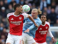 Soccer Football - Premier League - Manchester City v Arsenal - Etihad Stadium, Manchester, Britain - April 19, 2026 Arsenal's William Saliba in action with Manchester City's Erling Haaland REUTERS/Scott Heppell EDITORIAL USE ONLY. NO USE WITH UNAUTHORIZED AUDIO, VIDEO, DATA, FIXTURE LISTS, CLUB/LEAGUE LOGOS OR 'LIVE' SERVICES. ONLINE IN-MATCH USE LIMITED TO 120 IMAGES, NO VIDEO EMULATION. NO USE IN BETTING, GAMES OR SINGLE CLUB/LEAGUE/PLAYER PUBLICATIONS. PLEASE CONTACT YOUR ACCOUNT REPRESENTATIVE FOR FURTHER DETAILS..
