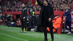 Atletico Madrid's Argentinian coach Diego Simeone reacts during the Spanish league football match between Sevilla FC and Club Atletico de Madrid at the Ramon Sanchez Pizjuan stadium in Seville on February 11, 2024. (Photo by CRISTINA QUICLER / AFP)