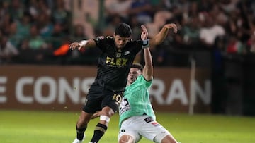 May 31, 2023; Leon, Guanajuato, Mexico; LAFC forward Carlos Vela (10) and Leon forward Lucas Di Yorio (18) battle for the ball during the second half of the CONCACAF Champions League championship at Estadio Leon. Mandatory Credit: Kirby Lee-USA TODAY Sports