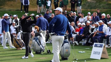 LAS VEGAS, NEVADA - DECEMBER 16: Scottie Scheffler of the PGA Tour watches as Rory McIlroy of the PGA Tour hits on the driving range before The Showdown: McIlroy and Scheffler v DeChambeau and Koepka at Shadow Creek Golf Course on December 16, 2024 in Las Vegas, Nevada. Kevin C. Cox/Getty Images/AFP (Photo by Kevin C. Cox / GETTY IMAGES NORTH AMERICA / Getty Images via AFP)