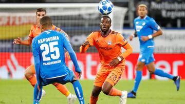 Soccer Football - Champions League - Group Stage - Group F - TSG 1899 Hoffenheim v Olympique Lyonnais - Wirsol Rhein-Neckar-Arena, Hoffenheim, Germany - October 23, 2018 Lyon's Tanguy Ndombele in action with Hoffenheim's Kevin Akpoguma REUTER