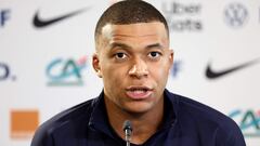 France's forward Kylian Mbappe looks on as he speaks during a press conference on the eve of the team's international friendly against Luxembourg, as part of their preparations for the UEFA Euro 2024 European football championships, in Longeville-les-Metz, eastern France, on June 4, 2024. (Photo by FRANCK FIFE / AFP)