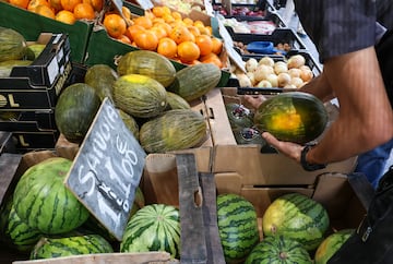 Summer demand | Melons and watermelons being sold at market.