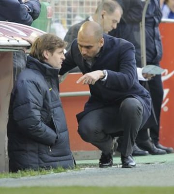 Tito con Guardiola durante el Racing de Santander-Barcelona de 2012.