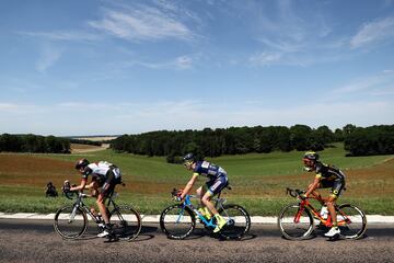 Los escapados del día: Perrig Quemeneur, Vegard Laengen y Frederik Backaert.