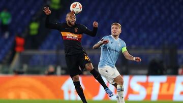 ROME, ITALY - DECEMBER 09: Marcao of Galatasaray battles for possession with Ciro Immobile of SS Lazio during the UEFA Europa League group E match between SS Lazio and Galatasaray at Olimpico Stadium on December 09, 2021 in Rome, Italy. (Photo by Paolo Br