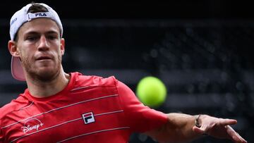 Argentina's Diego Schwartzman eyes the ball as he returns it to Russia's Daniil Medvedev during their men's singles quarter-final tennis match on day 5 at the ATP World Tour Masters 1000 - Paris Masters (Paris Bercy) - indoor tennis tournament at The AccorHotels Arena in Paris on November 6, 2020. (Photo by FRANCK FIFE / AFP)