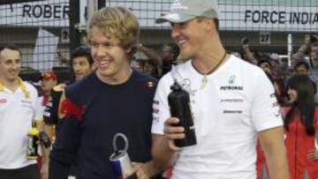 <b>GENIOS. </b>Schumacher y Vettel, dos generaciones de campeones.