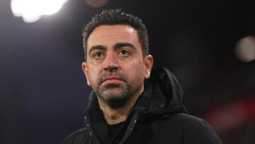 GRANADA, SPAIN - JANUARY 08: Xavi, Head Coach of FC Barcelona looks on prior to the La Liga Santader match between Granada CF and FC Barcelona at the Nuevo Estadio de Los Cármenes in Granada, Spain (Photo by Fran Santiago/Getty Images)