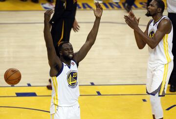 May 31, 2018; Oakland, CA, USA; Golden State Warriors forward Draymond Green (23) and forward Kevin Durant (35) react against the Cleveland Cavaliers during overtime in game one of the 2018 NBA Finals at Oracle Arena. Mandatory Credit: Cary Edmondson-USA