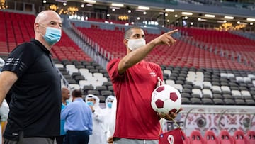 A handout picture released by Qatar&#039;s Supreme Committee for Delivery and Legacy on October 7, 2020, shows the FIFA President Gianni Infantino (L) touring the al-Bayt football stadium, under construction in al-Khor,  north of the Qatari capital Doha. 