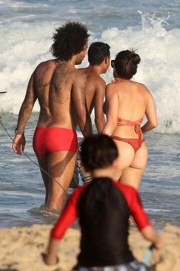 Marcelo relaxes with his family at the beach in Rio de Janeiro.