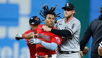 CLEVELAND, OH - AUGUST 05: Jose Ramirez #11 of the Cleveland Guardians is held by Michael Kopech #34 of the Chicago White Sox during a fight in the sixth inning at Progressive Field on August 05, 2023 in Cleveland, Ohio.   Ron Schwane/Getty Images/AFP (Photo by Ron Schwane / GETTY IMAGES NORTH AMERICA / Getty Images via AFP)