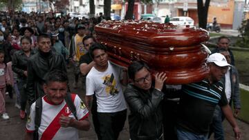 AYACUCHO, PERU - DECEMBER 17: Citizens take a tour of the streets of the city before burying 34-year-old John Henry Mendoza who died from 2 bullets to the chest, after the demonstration held at the airport in the city of Ayacucho on December 17, 2022. The eight deaths this week that made Ayacucho the epicenter of violence in the crisis that is still unfolding in Peru. The death toll in nationwide protests sparked by the ousting of former President Pedro Castillo has risen to 18, authorities said on Friday.Peru has declared a 30-day nationwide state of emergency as clashes between police and protesters rage on in several areas over Castilloâs impeachment and arrest on Dec. 7. (Photo by Klebher Vasquez/Anadolu Agency via Getty Images)