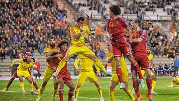 BRUSSELS, BELGIUM - NOVEMBER 16:  Gareth Bale of Wales clears the corner with a header during the Group B UEFA European Championship 2016 Qualifier match bewteen Belgium and Wales at King Baudouin Stadium on November 16, 2014 in Brussels, Belgium.  (Photo