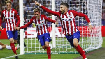 Torres, Griezmann y Carrasco celebran un gol del Atlético.