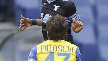 Lazio&#039;s Abdoulay Konko, top, heads the ball past Chievo&#039;s Alberto Paloschi.
