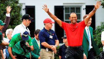 AUGUSTA, GEORGIA - APRIL 14: Tiger Woods of the United States reacts during the Green Jacket Ceremony after winning the Masters at Augusta National Golf Club on April 14, 2019 in Augusta, Georgia.   Andrew Redington/Getty Images/AFP
 == FOR NEWSPAPERS, INTERNET, TELCOS &amp; TELEVISION USE ONLY ==