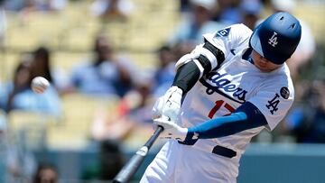 LOS ANGELES, CALIFORNIA - JULY 23: Shohei Ohtani #17 of the Los Angeles Dodgers hits a home run against the Minnesota Twins in the first inning at Dodger Stadium on July 23, 2025 in Los Angeles, California. Ronald Martinez/Getty Images/AFP (Photo by RONALD MARTINEZ / GETTY IMAGES NORTH AMERICA / Getty Images via AFP)