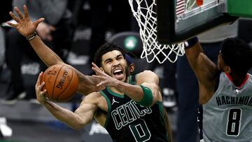 BOSTON, MASSACHUSETTS - FEBRUARY 28: Jayson Tatum #0 of the Boston Celtics shoots the game winning basket during the Celtics 111-110 win over the Washington Wizards at TD Garden on February 28, 2021 in Boston, Massachusetts. NOTE TO USER: User expressly acknowledges and agrees that, by downloading and or using this photograph, User is consenting to the terms and conditions of the Getty Images License Agreement. Maddie Meyer/Getty Images/AFP
== FOR NEWSPAPERS, INTERNET, TELCOS & TELEVISION USE ONLY ==